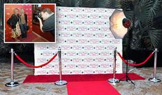 a red carpeted area with two pictures on it