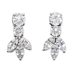 White Sapphire 3.78 carats Earrings set in 18 Karat White Gold Settings Width: 0.8 cm Length: 2.8 cm Total Weight: 5.60 grams "We first opened doors in 1980 when it was then situated in the vicinity of the Victory Monument; a small and modest storefront with a couple of counters. From its humble beginnings to where it stands today, our company has proven its abilities as a jeweler. Since the beginning, we have been supplying fine quality pieces to dealers, wholesalers and customers worldwide. Fr White Sapphire Earrings, Noble Lady, Diamond Pendants Designs, Jewelry Accessories Ideas, Accessories Ideas, Sapphire Earrings, Coat Women, Pendant Design, White Sapphire