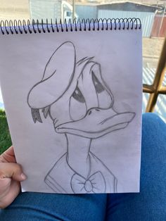 a drawing of a ducky with a hat on it's head is shown