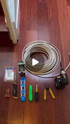 the tools are laid out on the floor to be used for electrical work and repair