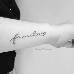 a woman's arm with the word fanlla written in cursive font