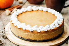 a pumpkin pie sitting on top of a wooden table