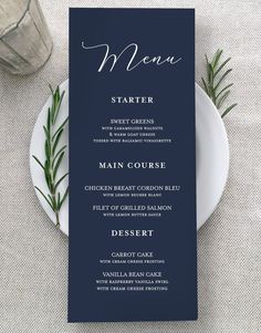 a table setting with a menu card on it