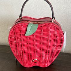 Nwt - Kate Spade - Honey Crisp Red Apple Wicker Crossbody Bag Product Details 12"H X 17'' (At Top) 14'' (At Bottom)W X 6"D Strap Drop: 22" Wicker Trim: Saffiano Enamel Spade Logo Two Way Spade Jacquard Lining Zip Around Closure Dust Bag Not Included Imported Style No. K8166 Smoke & Pet Free Home Red Handheld School Bag, Red School Bag For Spring, Red School Bag With Detachable Strap, Red Top Handle Bag For Spring, Red Shoulder Bag With Detachable Strap For School, Spring Red Top Handle Bag, Red School Shoulder Bag With Detachable Strap, Kate Spade Top Handle Bag For Spring, Red Bag With Removable Pouch For Spring