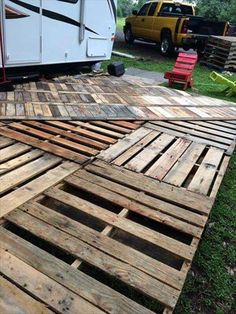 some wooden pallets are laying on the ground