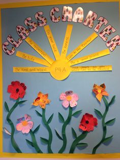 a bulletin board with flowers on it and the words class name spelled in yellow letters