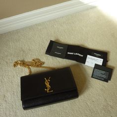 *New With Dust Bag & Ysl Cards Shown* This Iconic Bag Is A Permanent Saint Laurent Collection Kate Bag, Now Retails For $2400.00 + Taxes Saint Laurent Medium 'Kate' Leather Shoulder Bag, Black W/ Goldtone Hardware Goldtoned Hardware And Metal Ysl Logo At Front One Inside Open Slip Pocket Fully Lined Leather, Textured Lightly (Grain De Poudre) Magnetized Snap Closure Adjustable Chain Shoulder Strap, 19" Drop Measures: 9.4"W X 5.7"H X 2.1"D Made In Italy Ysl Kate Bag, Saint Laurent Collection, Ysl Kate, Saint Laurent Purse, Kate Bags, Bag Ysl, Ysl Logo, Brown Leather Shoulder Bag, Tassel Bag