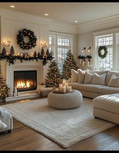 a living room decorated for christmas with candles and wreaths on the fireplace mantel