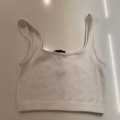 White Rubbed Zara Cropped Tank. Brand New Without Tags! Basic White Ribbed Crop Top, White Ribbed Scoop Neck Crop Top, Casual Ribbed Crop Top For Day Out, Trendy White Ribbed Crop Top, Trendy Seamless Tops By Zara, White Tank Top From Zara, Zara Casual Ribbed Crop Top, Casual Ribbed Crop Top By Zara, Zara Basic Stretch Crop Top