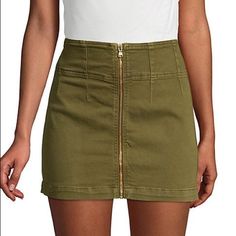 Size 24 Details A Denim Mini Skirt Offers A Refined, Elegant Style Into Any Ensemble. Fit: This Style Runs Large Sizing: 24=00, 25=0, 26=2, 27=4, 28=6, 29=8, 30=10, 31=10-12, 32=12 - Front Zip Closure - Denim Construction - Approx. 15.5" Length (Size 26) - Imported Fiber Content 93% Cotton, 5% Polyester, 2% Elastane Materials 2% Elastane 93% Cotton 5% Polyester Care Machine Wash Casual Mini Bottoms With Zipper Closure, Casual Mini Bottoms With Zipper, Casual Mini Length Bottoms With Zipper, Casual Denim Skirt With Zipper Closure, Casual Fitted Skirt With Zip Fly, Spring Bottoms With Zip Fly And Mini Length, Casual Denim Skirt With Zip Fly, Casual Mini Skirt With Zip Fly, Casual Summer Skirt With Zipper Closure