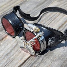 STEAMPUNK GOGGLES, Black with Red Lenses, Silver Accents and Magnifying Loupes, Great for Halloween, Black Post-apocalyptic Masks And Prosthetics For Festival, Post-apocalyptic Black Masks And Prosthetics For Festival, Black Post-apocalyptic Costume Accessories For Halloween, Vintage Black Mask And Prosthetics For Costume, Black Steampunk Masks And Prosthetics With Adjustable Fit, Black Adjustable Steampunk Masks And Prosthetics, Black Steampunk Masks And Prosthetics For Cosplay, Airship Captain, Aviator Goggles