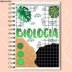 a spiral notebook with the words cocologia on it and some plants in front