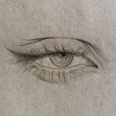 a drawing of an eye with long lashes