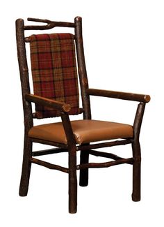 a wooden chair with a plaid seat and back cushion on the arm rests against a white background