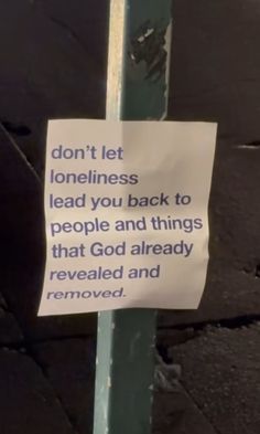 a sign posted on a pole that says don't let loneness lead you back to people and things that god already revealed