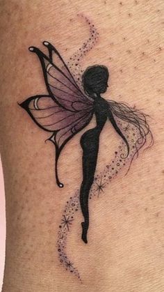 a woman with a tattoo on her stomach has a fairy tinkerbell in the shape of a butterfly