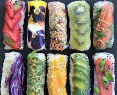 sushi rolls with different types of fruits and vegetables on them are arranged in a grid