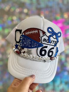 Get ready to cheer on the Sapulpa Cheiftains in style with our GameDay Trucker Hat! Made with authentic Route 66 flair, this hat is perfect for football fans and road trip enthusiasts alike. Add a touch of quirkiness to your game day outfit with our Sapulpa Cheiftains Route 66 Trucker Hat! White Sports Fan Hat For Game Day, White Snapback Trucker Hat For Winter, Game Day Cap For Football Season, Sports Fan Hats For Football Season Game Day, Sports Fan Snapback Hat, Football Season Sports Fan Cap, Sports Fan Cap For Football Season, White Sports Fan Hat, One Size Fits Most, White Sports Fan Hat One Size Fits Most