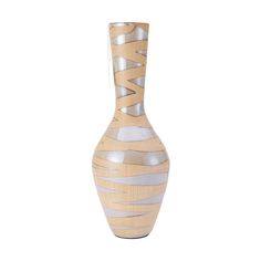 a white and beige vase with lines on it's sides, against a white background