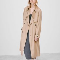 Aritzia Babaton Trench Coat In Size Xs. Drapey, Lightweight, And Slightly Roomy Fit. Classic Trench Coat In A Neutral Tan Color, Featuring: Epaulettes, Pockets, Belted Cuffs, Double Breasted Buttons, Adjustable/Removable Belt, Back Vent, Partially Lined. Worn Less Than 5x, No Rips Stains Or Flaws. A Little Wrinkled From Being Stored In The Closet. Approximate Measurements: Center Back To Bottom Hem: 42.5” Sleeve Length From Shoulder Seam: 22.5” Shoulder To Shoulder: 17” Beige Belted Outerwear For Daywear, Brown Gabardine Fall Outerwear, Brown Gabardine Outerwear For Fall, Chic Brown Gabardine Outerwear, Beige Outerwear For Fall Daywear, Spring Brown Gabardine Outerwear, Brown Gabardine Outerwear For Spring, Brown Gabardine Outerwear, Casual Gabardine Outerwear For Office