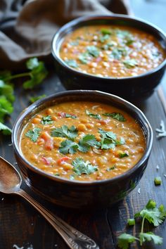 Two bowls of hearty soup garnished with fresh cilantro. Savory Lentils, Coconut Curry Lentil Soup, Green Coconut Curry, Curry Lentil Soup, Nourishing Soup, Roasted Cauliflower Steaks, Curried Lentil Soup