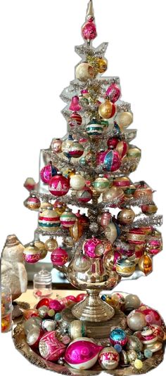 a christmas tree made out of glass ornaments