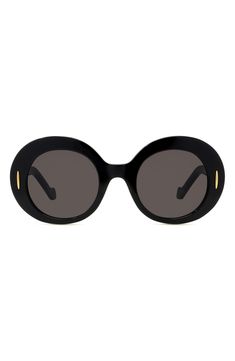 A looping, golden logo adorns the temples of sleek Italian-made oval sunglasses equipped with scratch-resistant CR-39 lenses. 50mm lens width; 24mm bridge width; 140mm temple length 100% UV protection CR-39 lenses Acetate Made in Italy Luxury Black Round Frame Sunglasses, Black Oval Sunglasses With Gradient Lenses, Oval Black Sunglasses With Gradient Lenses, Luxury Oval Sunglasses With Tinted Lenses, Modern Oval Sunglasses With Uva Protection, Modern Oval Sunglasses With Polarized Lenses, Modern Oval Polarized Sunglasses, Luxury Oval Sunglasses With Mirrored Lenses, Luxury Oval Sunglasses With Gradient Lenses