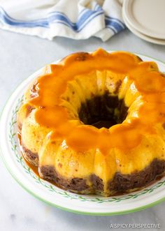 a bundt cake on a green and white plate