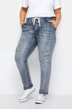 Shop Evans Blue Washed Distressed Drawstring Jeans at Yours Clothing. Discover women’s plus size clothing in sizes 10-36 with fast delivery. Plus Size Ripped Jeans, Drawstring Jeans, Ripped Mom Jeans, Denim Joggers, Jeans Distressed, Ripped Denim, Edgy Look, Fashion Fits, Jogger Jeans