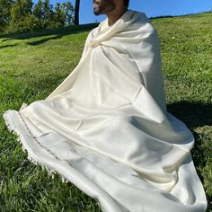 "-100% Merino Wool from Australian highlands and over 8' long by 4' wide. -Handcrafted in Himalayan region -Dry Clean or Handwash Cold only -White This meditation blanket is light-weight, cosy, and warm, being sourced from Merino sheep in the Australian highlands. This fine, most sought-after material is then handcrafted in the Himalayan region. The result is a soft, strong, high quality meditation blanket that is sure to make you feel peaceful and at home. It will also make a good car blanket, a throw blanket on your couch or bed, or a stylish oversize scarf that you can wear to keep warm. You can use it also as a baby blanket, a travel blanket on airlines, or a quality ethnic home décor. It is a perfect gift item. The special \"boxed\" design comes in only the one pattern that's pictured Oversize Scarf, Meditation Blanket, Meditation Shawl, Car Blanket, Ethnic Home Decor, Merino Sheep, Travel Blanket, Wool Shop, Oversized Scarf