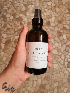 Our Rapunzel Hair Serum truly feels like it comes straight out of the fairy tale. Made with only the purest ingredients and essential oils, this serum does not contain alcohol so it is safe for septic systems and does great with hard water too! Our essential oils and ingredients are harvested in the most sustainable and ethical ways possible. Each product is hand crafted and blended with care. INGREDIENTS: Distilled Water Alcohol-Free Witch Hazel Vegetable Glycerin Lavender Essential Oil (Lavandula angustifolia) Cedarwood Himalayan Essential Oil (Cedrus deodara) Rosemary ct. verbenone Essential Oil (Rosmarinus officinalis) Peppermint Essential Oil (Mentha x piperita) Lemongrass Essential Oil (Cymbopogon citratus) Tea Tree Essential Oil (Melaleuca alternifolia) Ylang Ylang Essential Oil (Ca Essential Oil Hair Spray, Young Living Hair Growth Serum, Essential Oil Hair Serum, Essential Oil Hair Perfume Spray, Mermaid Hair Essential Oils, Cymbopogon Citratus, Cedrus Deodara, Septic Systems, Ylang Ylang Essential Oil