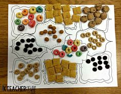 a paper cut out with cereal and other food items on it, sitting on top of a wooden table