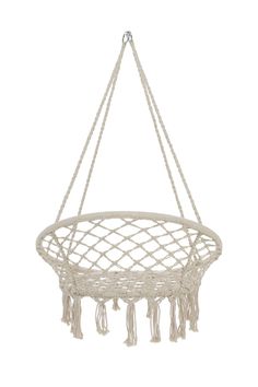 a white macrame hanging basket with tassels