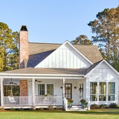 the front cover of an old soul magazine featuring a white house with porches and windows