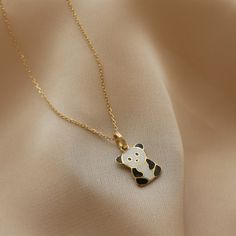 14k Real Gold Necklace White-Black Enamel Panda Pendant Minimalist Animal Design Dainty Gift for Women Christmas Valentine's Day Elegance ⓂMaterials & Specifications : Necklace Chain Lengths : 42 cm (16.5 in) 44 cm (17.3 in) 46 cm (18.1 in) 48 cm (18.8 in) 50 cm (19.6 in) Panda Pendant Width : 0.9 cm (0.35 in) Panda Pendant Length : 1.2 cm (0.47 in) Black Enamel Necklace For Gift, Gift Black Enamel Necklace, Sterling Silver Necklace With Yellow Gold And Black Enamel, Black Tarnish-resistant Charm Necklace As Gift, Black Enamel Jewelry As Gift, Yellow Gold Necklaces With Black Enamel For Gift, Black Enamel Jewelry For Gift, Black Enamel Jewelry For Gifts, Yellow Gold Enamel Necklace For Gift