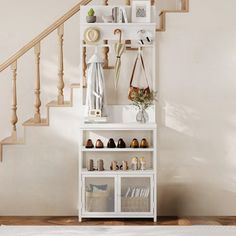 a white shelf filled with shoes next to a stair case and handbag on top of it