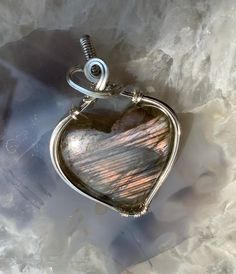 Labradorite Heart wrapped in 925 sterling silver Wire Wrapped Jewelry For Valentine's Day Anniversary, Valentine's Day Wire Wrapped Jewelry For Anniversary, Unique Hand Wrapped Jewelry For Anniversary, Elegant Heart-shaped Natural Stone Jewelry, Elegant Heart Shaped Natural Stone Jewelry, Nickel Free Labradorite Jewelry As Gift, Nickel-free Labradorite Jewelry As Gift, Nickel Free Labradorite Jewelry For Gift, Silver Spiritual Heart Cut Jewelry