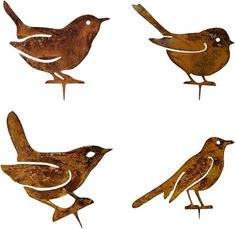 four metal birds sitting on top of each other in different shapes and sizes, with one bird standing next to the other