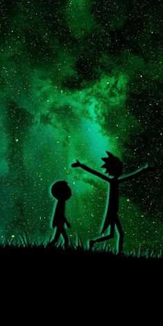 two children are silhouetted against the night sky with green and blue stars in the background