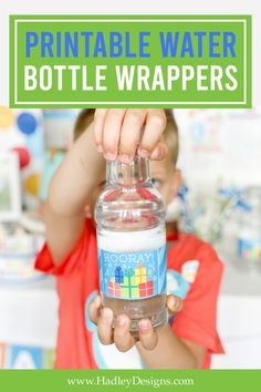 a young boy holding up a bottle with water in it and the words printable water bottle wrappers