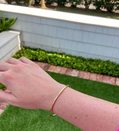 Our Tube Bangle is so beautiful! It is made in 14k polished yellow gold & hinged to make taking it on & off easy. 14k Yellow Gold 2 1/2" across Oval 3mm thick Hinged bangle with safety clasp Classic Jewelry With Gold Clasp, Classic Everyday Jewelry With Gold Clasp, Classic Bangle Bracelet With Spring Ring Clasp, Classic Jewelry With Gold Clasp For Everyday Luxury, Classic Adjustable Hoop Bracelets, Classic Everyday Bracelets With Spring Ring Clasp, Classic Adjustable Bangle For Everyday Luxury, Classic Everyday Bangle, Tarnish Resistant, Minimalist 14k Gold Bangle For Everyday Luxury