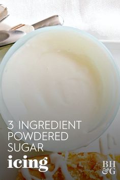 grandma's powdered sugar icing recipe on a white plate with spoons