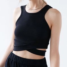 Cropped Tank With Bottom Wrap From Urban Outfitters. Nwt Size M Black Cropped Versatile Tank Top, Versatile Black Cropped Tank Top, Chic Black Tank Top For Workout, Versatile Black Tank Top For Spring, Chic Black Workout Tank Top, Black Crop Top For Spring Workout, Black Sporty Crop Top For Spring, Black Spring Workout Tank Top, Edgy Black Tank Top For Workout