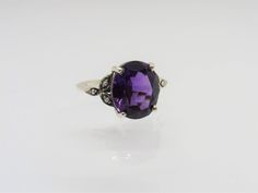 Vintage Sterling Silver Amethyst & Seed Pearl Ring ...Marked 925...Total of weights 3.1grams...Size 9...Measure of stone center 12 x 10MM...It's in very good condition. Formal Fine Jewelry Amethyst Ring, Classic Stone Rings For Formal Occasions, Classic Rings With Stones For Formal Occasions, Oval Amethyst Ring For Anniversary, Classic Formal Rings With Stones, Oval Amethyst Rings With Stones, Oval Amethyst Ring With Stones, Oval Purple Ring With Stones, Seed Pearl Ring