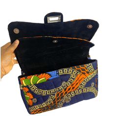 This bag is a cute bag with many compartments -It’s available in exact fabric . -Made out of good quality Ankara fabric -Value for your money -This product is an ideal gift for the mother, the girl, the beloved, the sister - It is very functional - It is easy to carry - It comes in bright beautiful prints - It is very trendy and a great addition to complement your look - It is very durable and easy to clean. - Spacious compartments and additional pocket to organize your belongings -Magnetic clas