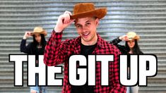 a man wearing a cowboy hat with the words the git up in front of him