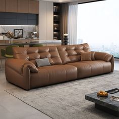 a living room filled with furniture next to a large window overlooking the cityscape