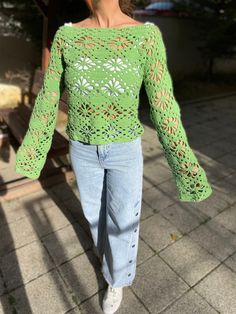 - Crochet Green Pullover Sweater  - The model is wearing a medium 50 kg, 1.65 length - %100 Cotton yarns - Completely Hand-knitted  - It is recommended to wash at 30 degrees or just hand wash with cold water. - After we ship your product, we give you a tag number. This number is updated within the first 24 hours. Then you can follow the updates by clicking on them. Welcome to Bhava's 🌻 Here you will find tops, skirts, shirts, dresses, cardigans, and many more women, men, and unisex clothing. All of my products are knitted, photographed, packaged, and delivered to you by myself. Each of my products takes days, sometimes weeks, and months of work, you can feel it when you touch them. For my designs; I am inspired by the bohemian spirit, the summer spirit, the sun, nature, and all the colors Crochet Green Top, Crochet Summer Sweater, Green Crochet Sweater, Green Crochet Top, Crochet Long Sleeve Top, Crochet Long Sleeve Tops, Crochet Green, Fall Crochet Patterns, Green Pullover