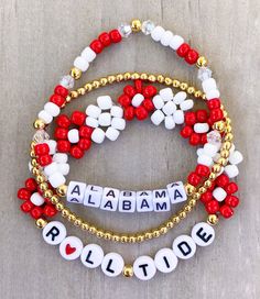 Alabama Bracelets  ❤️❤️ Are you ready for some football?? 🏈 Get game day ready with this cute football stack!! Mix and match or buy bracelets individually. Made with 4mm seed beads, 18k gold filled beads and small square 4mm letter beads.  CARING TIPS FOR YOUR JEWELRY ⭐️Treat and store with care. ⭐️ For longevity, avoid exposing your jewelry to water. ⭐️ Avoid having direct contact with lotions, perfumes, sanitizers as these chemicals may cause discoloration of your jewelry. Personalized White Bracelets For Football Season, Adjustable White Bracelets For Team Events, Game Day Jewelry, Alabama Gameday Outfit, Univ Of Alabama, Super Bowl Outfit, Inspired Bracelets, Football Bracelet, Creek House