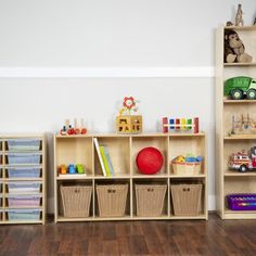 a child's room with toys and bookshelves